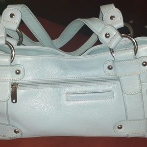 Pastel blue MC soft leather purse.